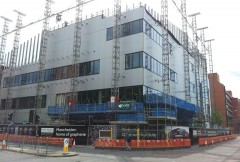 Taking shape: the National Graphene Institute at Manchester, UK. The state-of-the-art facility is due to open in March 2015, but staff will start moving in from October this year to begin proving out the building services.